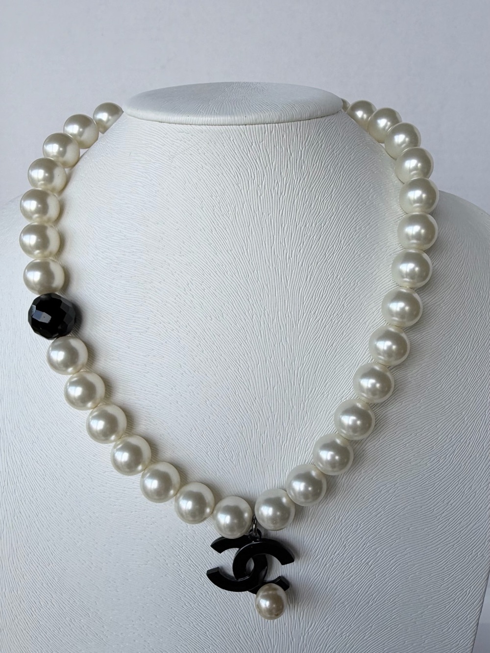 CHANEL Ivory Pearl Necklace with Black CC Charm